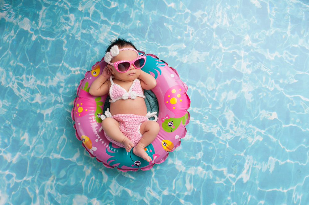 Plávanie s bábätkom. Foto: Shutterstock